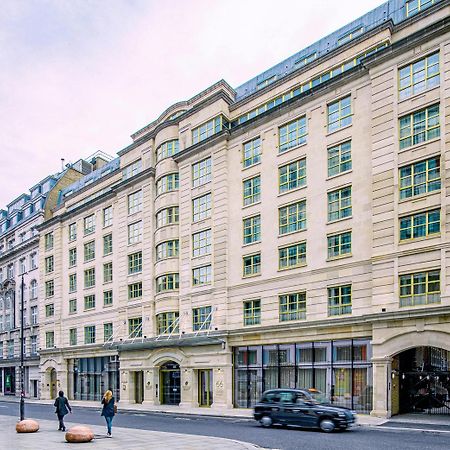 Middle Eight - Covent Garden - Preferred Hotels And Resorts 런던 외부 사진 The photo shows a large, multi-story building with a classical architectural style. The facade features a mix of light-colored stone and large windows, giving it a sophisticated appearance. The building has several levels with prominent horizontal li