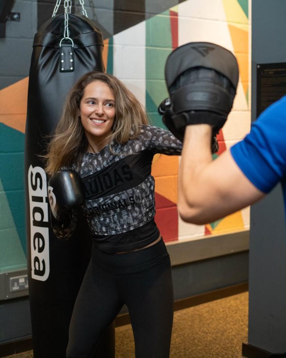 Middle Eight - Covent Garden - Preferred Hotels And Resorts 런던 외부 사진 A woman training with a heavy bag